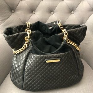 Juicy Couture Black quilted leather and suede bag